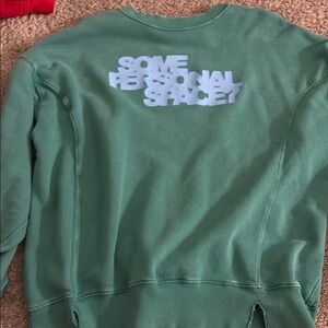 Green Sweater with rips